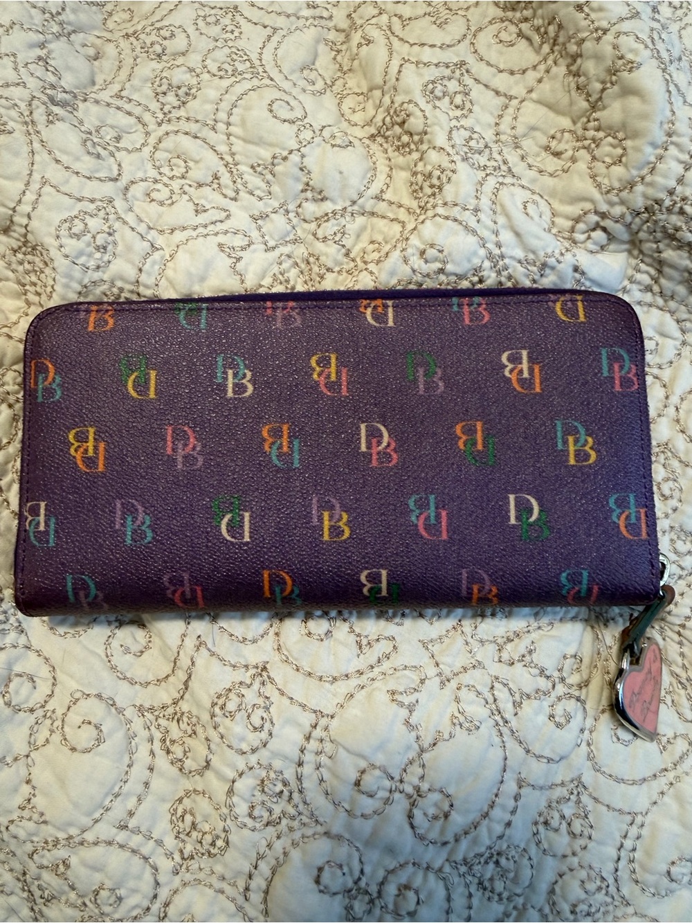 Dooney and Bourke Purple Zip-Around Wallet with Multicolor Monogram
